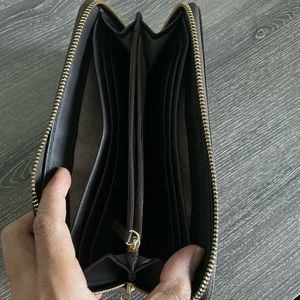 Michael lies wallet used